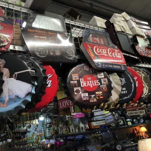 OR07 The cozy nooks of this eclectic shop are filled with a charming display of decor and vintage-style signs, including the Metal Bottle Cap Display, capturing the essence of Dapitan's bustling markets.