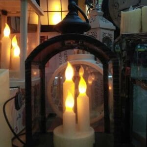 A Big Ben Clock Tower Table Decor is tastefully arranged alongside LED lanterns and other home decor pieces, creating an inviting ambiance reminiscent of Dapitan's famed markets.