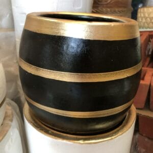 A Black Container - Small from Dapitan, designed with black and gold stripes, perfect for adding a touch of elegance to your home this Christmas season.