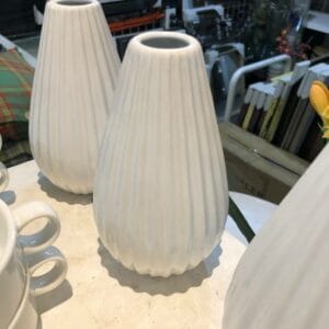 A trio of black containers - small in size - grace the display in a Dapitan store, adding a touch of elegance to your home decor.
