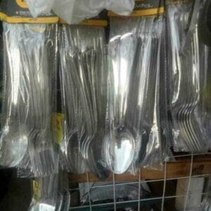 Stainless Steel Spoon and Fork Dinnerware dinnerware Packs of Stainless Steel Spoon and Fork sets hang on display in a Dapitan home store, their sleek design adding a touch of decor elegance.