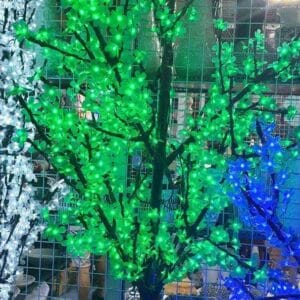 Lighted Christmas Trees in green, white, and blue create a stunning display in this Dapitan store setting, perfect for adding a touch of elegance to your home decor.