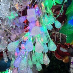 A vibrant decor masterpiece, the Christmas String Lights feature various shapes that dangle together, creating a lively ambiance reminiscent of Dapitan's eclectic charm.