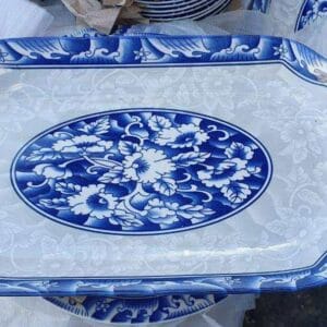 A Ceramic Serving Plate with a blue and white floral pattern, ideal for enhancing the elegance of your home decor, is beautifully showcased on display in Dapitan.