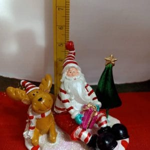 Christmas Decoration Sitting Santa with Moose Figurine display